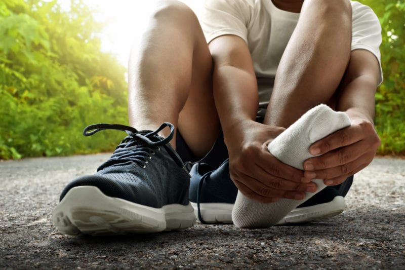 runner with blisters on feet - causes - treatment